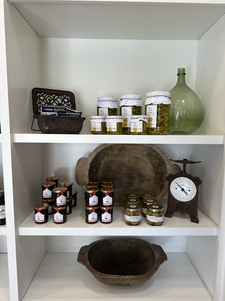 Shelf of antiques at Grange Garden Market