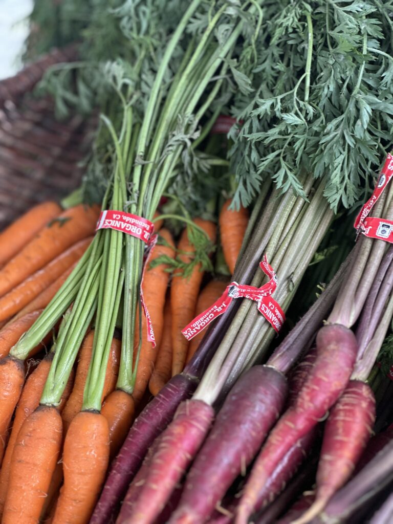Farm fresh organic rainbow carrots at Grange Garden Market